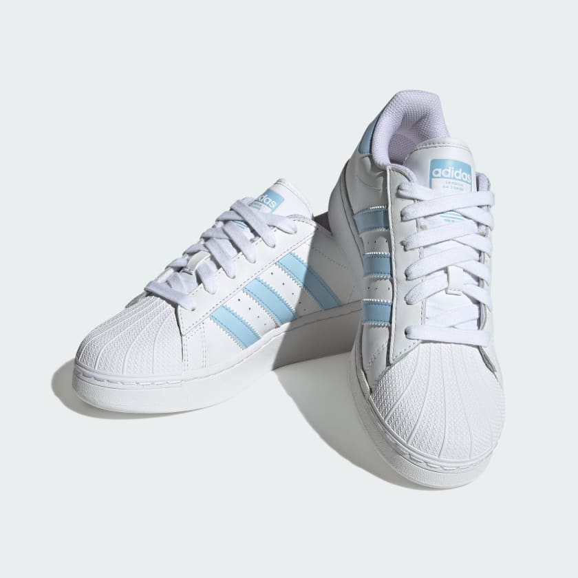 Кроссовки суперстар женские. Адидас рокстар кроссовки. Adidas кеды superstar. Адидас кроссовки суперстары. Адидас триколор.